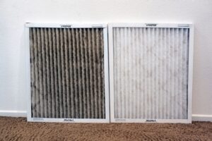 Dirty and clean air filter side by side for comparison