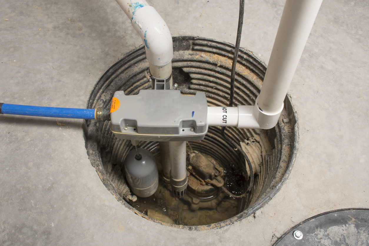 A sump pump installed in a basement