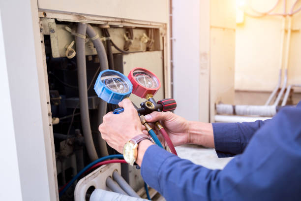 Technician is checking air conditioner